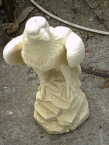 concrete falcon white statue